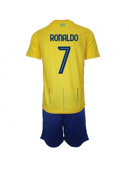 Otroški Nogometna dresi replika Al-Nassr Cristiano Ronaldo #7 Domači 2023-24 Kratek rokav (+ hlače)